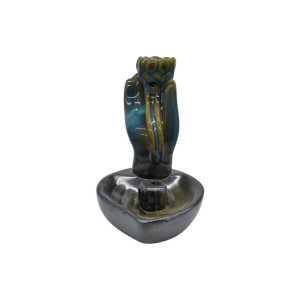 Incensario de cerámica en forma de mano con flor